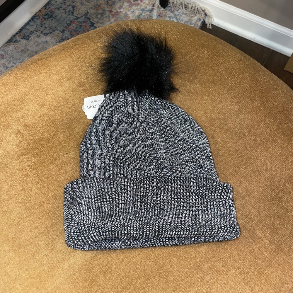Silver and black beanie with pom pom